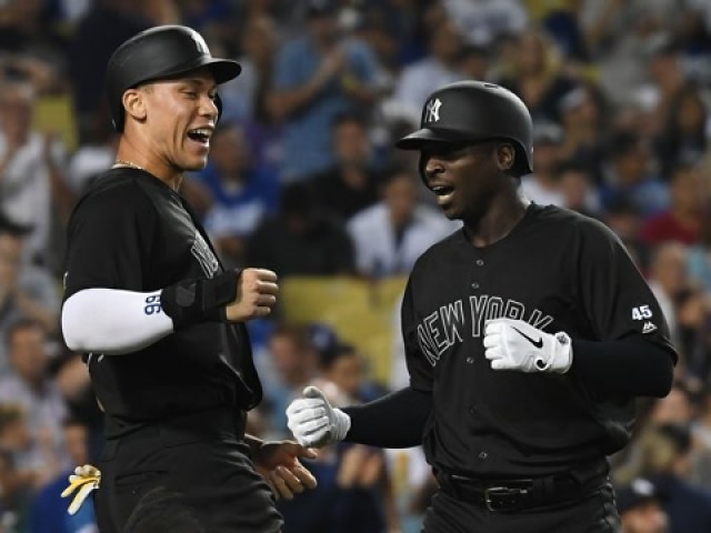 包含印尼羽毛球队鏖战英格兰羽毛球队，马琳统治全场的词条